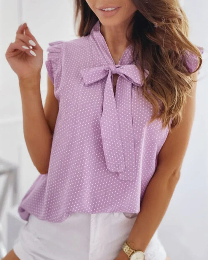 Sleeveless Blouse with Ruffles and Bow Detail